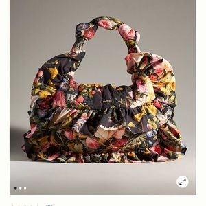 SELKIE fete de fleurs couch cushion clutch from Anthropologie